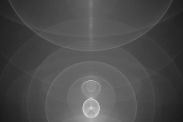 Abstract Black and White Lens Flare with Concentric Light Circles and Optical Reflections Creating...