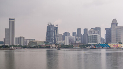 Naklejka premium Skyline with skyscrapers of Marina Bay timelapse hyperlapse.