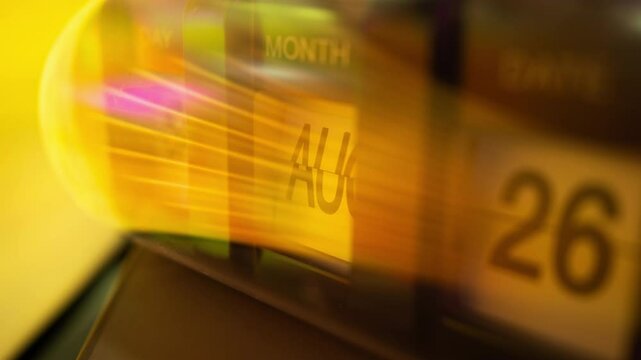 Time lapse of flip clock calendar in futuristic moving yellow light trail. Time travel concept.