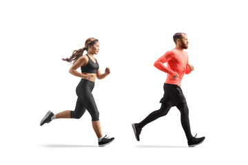 Full length profile shot of a young asian woman and caucasian guy jogging