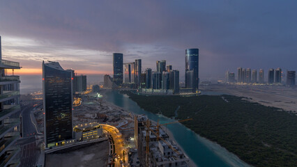 Buildings on Al Reem island in Abu Dhabi timelapse from above.