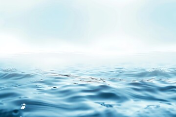 Naklejka premium A serene view of calm blue water with soft ripples and a tranquil atmosphere, perfect for relaxation and meditation.