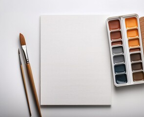 watercolor paper with colors and brushes, art supplies