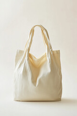 Eco-friendly shopping tote bag, minimal design presented on a neutral light background. Mockup of blank tote bag for groceries and shopping