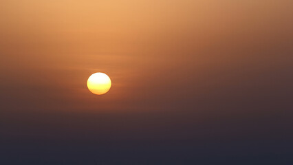 Sunrise with cityscape of Ajman from rooftop aerial timelapse.