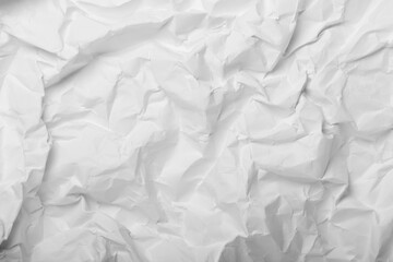 Obraz premium White crumpled paper creating an abstract texture background
