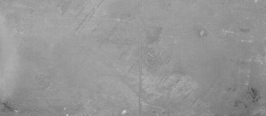 Uneven gray concrete wall showing texture and cracks