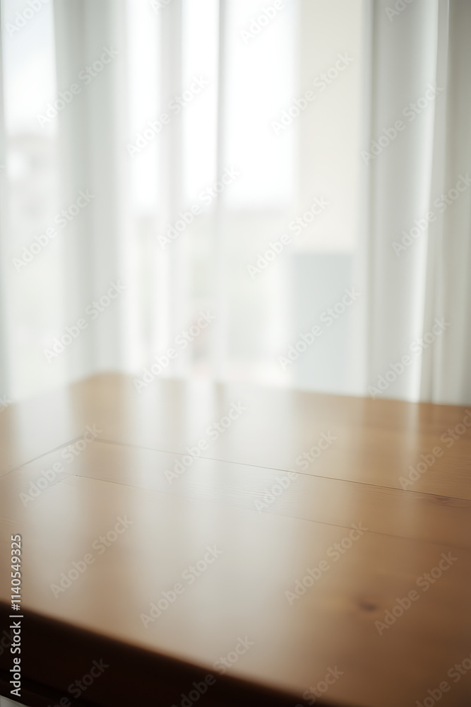 Poster A wooden table in a room with a blurred white curtain behind it, partially obstructing a view through a window._00001_