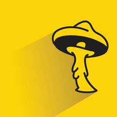 mushroom with shadow on yellow background