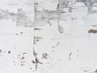 Cracked white paint on wall texture  
