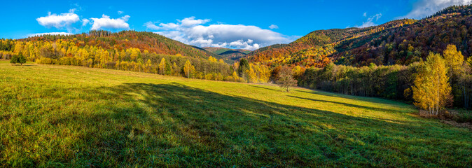 Autumn landscape with mountains and sky