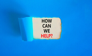 How can we help symbol. Concept words How can we help on beautiful white paper. Beautiful blue table blue background. Business and how can we help concept. Copy space.