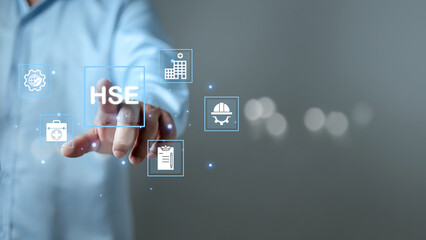 HSE, Health safety environment concept, Standard safe industrial work and industrial, Businessman touch virtual HSE icon for business and organization, Safety and protection in industrial work.