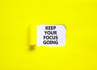 Keep your focus going symbol. Concept words Keep your focus going on beautiful white paper. Beautiful yellow background. Business and keep your focus going concept. Copy space.