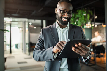 Business team collaborating on project in modern office environment