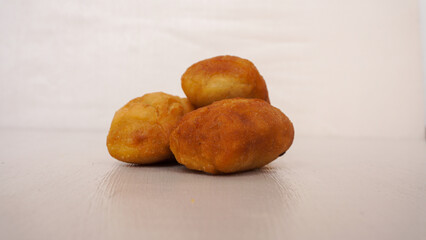 Fried bread or Roti Goreng or Odading isolated white. 