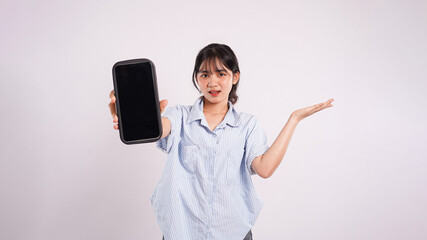 Portrait of beautiful Asian woman posing using phone on white background	