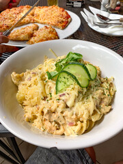 Pasta with bacon and cream sauce.