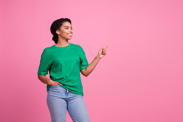 Photo portrait of attractive young woman look point empty space dressed stylish green clothes...