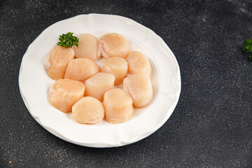 Raw sea scallop seafood fresh tasty food dish delicious gourmet food background on the table rustic food top view copy space keto and paleo diet vegetarian  food pescetarian diet