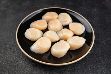 Raw sea scallop seafood fresh tasty food dish delicious gourmet food background on the table rustic food top view copy space keto and paleo diet vegetarian  food pescetarian diet