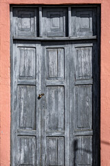 A door with a lock and a keyhole