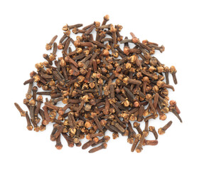 Pile of dry clove buds on white background, top view. Aromatic spice