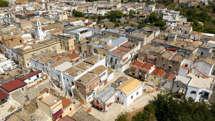Aerial view of houses, apartments and buildings located in the historic center of the town of Bernalda, in the province of Matera, Basilicata, Italy. It is a traditional Italian village.