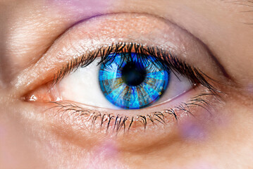 Obraz premium Human eye with Smart Artificial lens digital vision close up. Intraocular lens implantation concept
