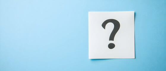 White paper with a question mark on a blue background, a banner for copy space