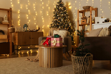 Stylish interior of modern living room with Christmas tree and gifts on wooden table