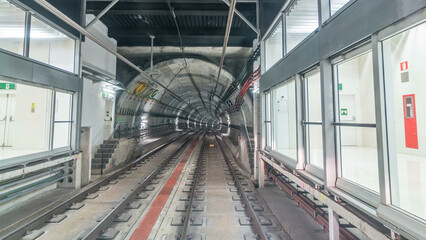 Moving in the subway tunnel with light trails inside timelapse