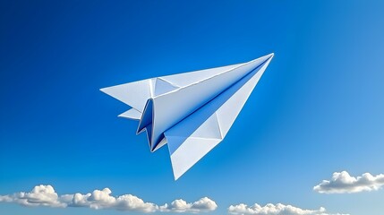 Paper Airplane Soaring Above Bright Blue Sky with Fluffy Clouds
