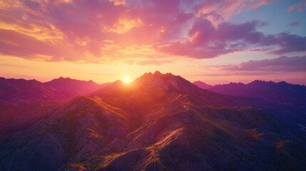 Fototapeta premium Breathtaking Sunset Over Majestic Mountains in Vibrant Colors and Soft Light