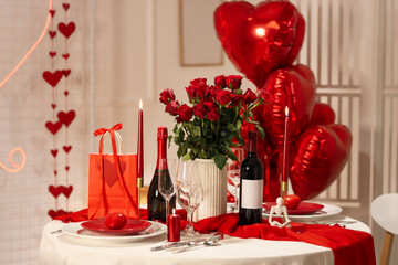 Interior of room with dining table served for Valentine's Day, closeup