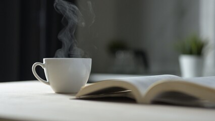 Enjoying Coffee and Reading at Home Cozy Environment Lifestyle Content Indoor Space Relaxed Viewpoint Serenity and Comfort