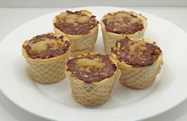 baked waffle baskets filled with minced meat and cheese