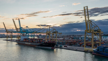 Aerial view of the sea cargo port and container terminal of Barcelona timelapse, Barcelona, Catalonia, Spain.