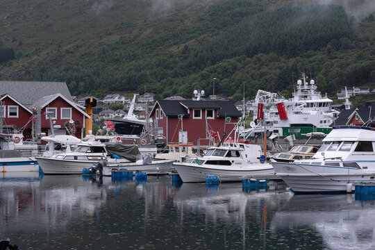 Fosnavag, Norway, July 17, 2023; Fosnavag is a small fishing city in Heroy, Norway with red wooden houses