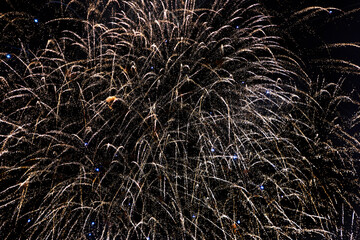 Fireworks on the dark sky background at festival.