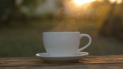 Enjoying Hot Drinks Like Americano and Espresso at Sunrise in Serene Outdoor Environment