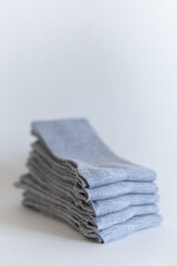 gray socks with a stack of fan coloring. close-up on a white background