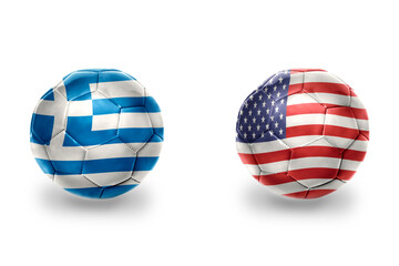football balls with national flags of greece and united states of america ,soccer teams. on the white background.
