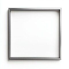 Obraz premium A modern metal frame with thin, sleek lines and a brushed silver surface on a white background 