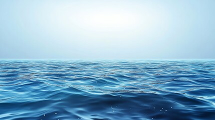 Obraz premium Serene view of calm blue ocean waves under a clear sky.