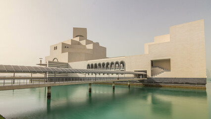 Qatar's museum of Islamic Art timelapse hyperlapse on its man-made island beside