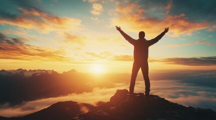 Fototapeta premium Silhouette person, arms raised, mountaintop sunset.