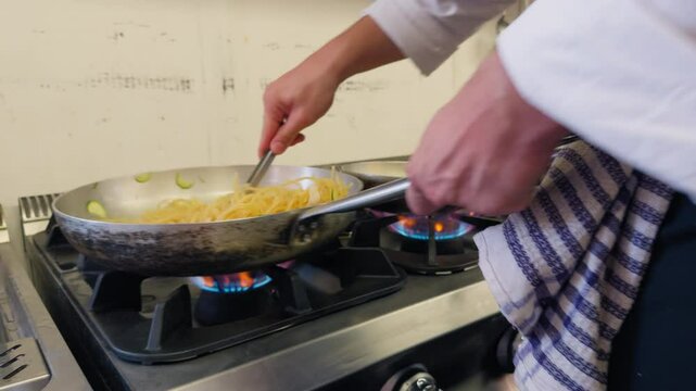 Cooking Zucchini And Shrimp In The Pan Of A Restaurant Kitchen