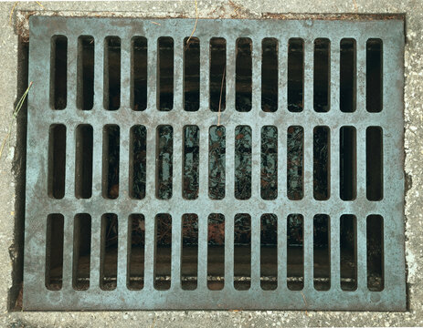Cool background looking down a water grate