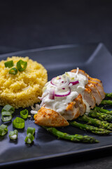 Green asparagus with grilled chicken fillet and couscous